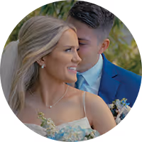 Jacob and Melissa smiling together outdoors at their Montana wedding